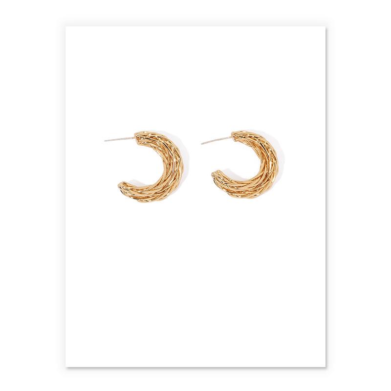 Nest-Shaped Hoops In Gold