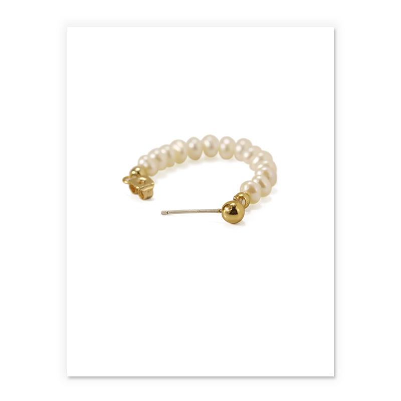 Dainty Pearl Huggies In Gold