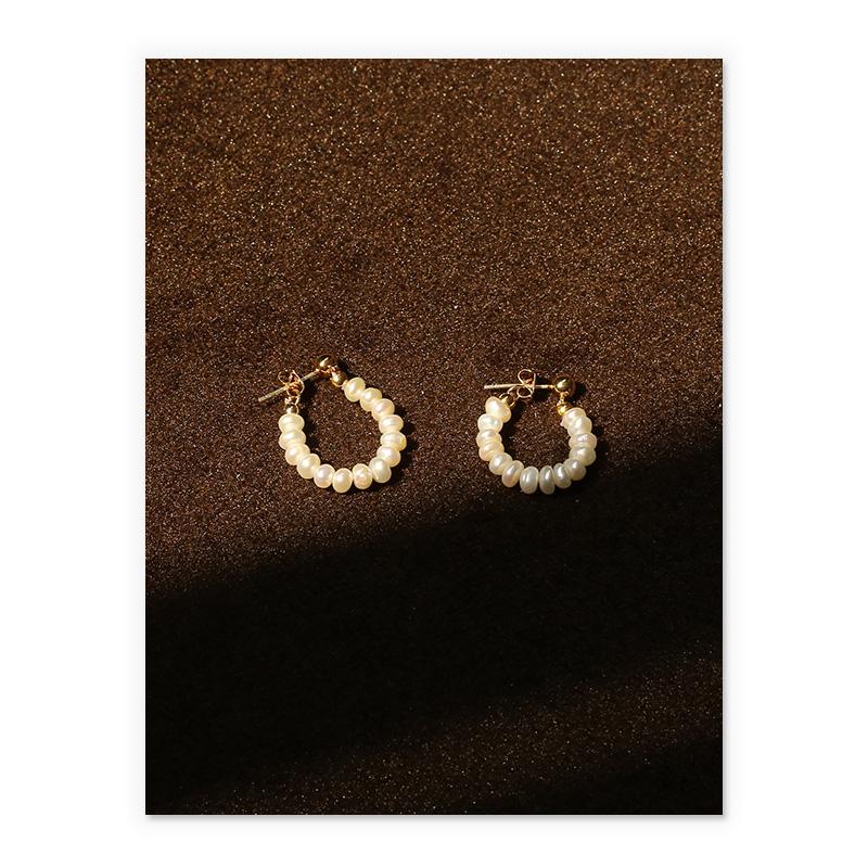 Dainty Pearl Huggies In Gold